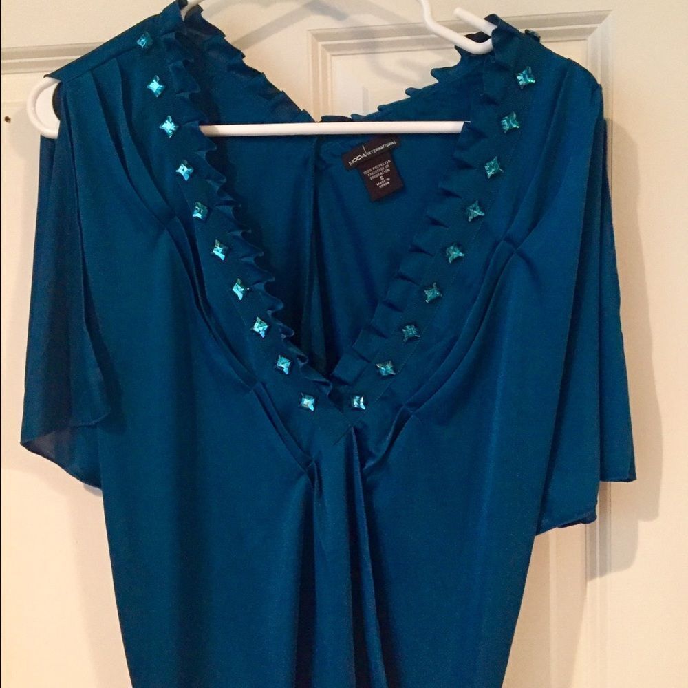 Beautiful party blouse by Moda international